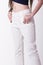 White women trousers in white background.