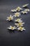 White wood anemone blossoms on black background