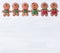 White wooden boards with Christmas cookies on upper border