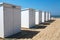 White wooden cabins on the beach in Knokke in Belg