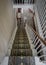 White wooden carpeted residential staircase