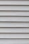 White wooden damaged window blinds