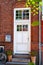 White Wooden Door to Townhouse