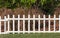 White wooden fence in farmland marks for land property and dry t