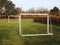 White Wooden Football Goals on Game Field