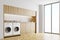 White and wooden laundry room, side