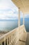 White wooden porch with an ocean view