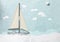 White wooden toy sailing boat