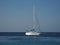 White yacht at clear turquoise waters of Caribbean Sea landscape in Cancun city in Mexico with horizon line