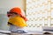 White, yellow and orange hard safety hat