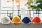 White, yellow and other colored safety helmets for workers` safety projects in the position of engineers or workers on concrete