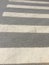 White zebra crossing on cement highway