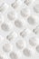 White zephyr marshmallows pattern on white background