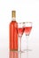 White zinfandel wine bottle with two glasses