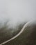 Whiteface Veterans Memorial Highway in fog, in the Adirondack Mountains, New York