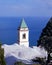 Whitewashed church on hillside, Lone, Italy.