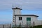 Whitewashed Coastguard Station Located Above the Irish Sea