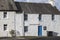 Whitewashed cottages in Kirkcudbright in Scotland.