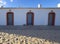 Whitewashed fishermen huts, converted into tourist facilities, Tavira, Portugal