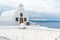 Whitewashed Greek orthodox church in Oia, Santorini