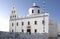 Whitewashed houses and blue dome church by the Aegean sea, Santoriniin Oia, Santorini, Greece. Famous blue domes in Oia village,