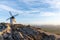 A whitewashed windmill in La Mancha in warm evening light