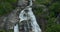 Whitewater Falls in Nantahala National Forest, North Carolina, USA. Clear water falling down from rocky boulders between