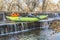 Whitewater inflatable kayak on a river dam