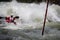 Whitewater kayaker negotiates high water rapid