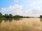 Whiteâ€‹ cloudsâ€‹ in theâ€‹ blue skyâ€‹ Cloudy natural backgroundâ€‹ beautifulâ€‹ â€‹natureâ€‹ greenâ€‹ bushâ€‹ river