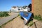 Whitstable Kent. England. An old oyster harvesting rowing boat on the shore