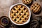 Whole baked mixed berry crust pie or tart with lattice, mini tarts.