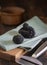 Whole black truffles mushroom on wooden board on green napkin, close up