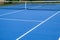 Whole blue tennis court, synthetic rubber lawn