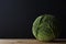 Whole Cabbage on Wooden Table