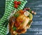 Whole chicken fried prepared, homemade grilled rustic gourmet garlic wooden background