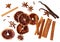 Whole cinnamon isolated. Whole cinnamon sticks, orange circle dry cloves, vanilla pods and spicy cloves isolated on white