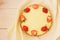 A whole classic strawberry cheesecake Top view