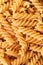 Whole corn fusilli food background