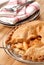 Whole deep dish apple pie with a flaky crust