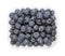 Whole fresh blueberries, ripe and dark blue fruits, in a clear plastic punnet