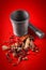 WHOLE GARAM MASALA MACRO ON RED BACKGROUND