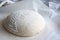 Whole grain bread dough rising on table