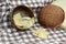 Whole grain crackers / crispy bread in wooden bowl on the table in the kitchen