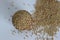 Whole grain hulled barley in wooden bowl