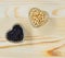 Whole grains of wheat and riceberry in glass heart shaped bowl