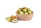 whole and half cut fresh Chinese Jujube in wooden bowl and on white background