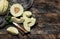 Whole, half and sliced of an Ivory gaya melon on a wooden background