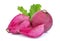 Whole and half sweet red radish with green leaves isolated