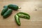 Whole and halved jalapeno peppers